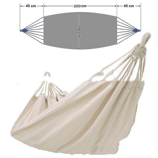 Durable canvas hammock hanging in a backyard garden